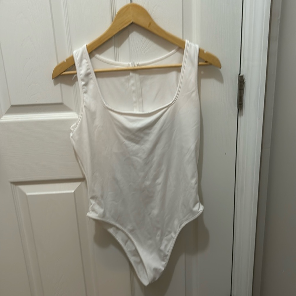 White Amazon back zip body suit